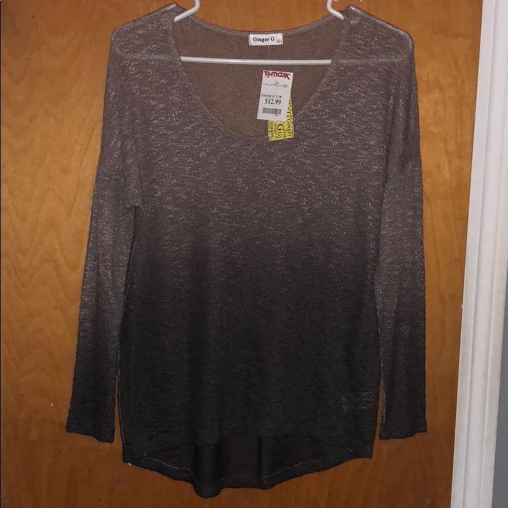 A brown to black ombre shirt that is longsleeved